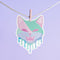 Adorable pastel kitty sticker with a cheeky fanged smile, perfect for adding a playful touch to your accessories. Available in Prism, Gem, and Glitter finishes. Handmade in Austin, Texas.
